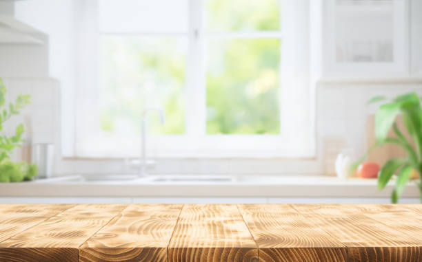 istock Selective focus.wood counter,table top on blur kitchen counter in morning background. 2166446779