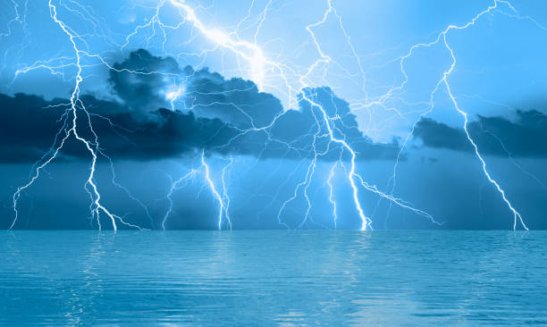 istock Lightning storm over sea at night 2166447102