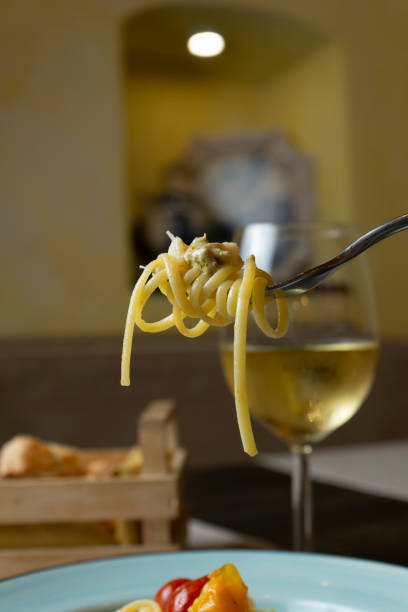 istock Faork holding spaghetti with tomato sauce 2166447482