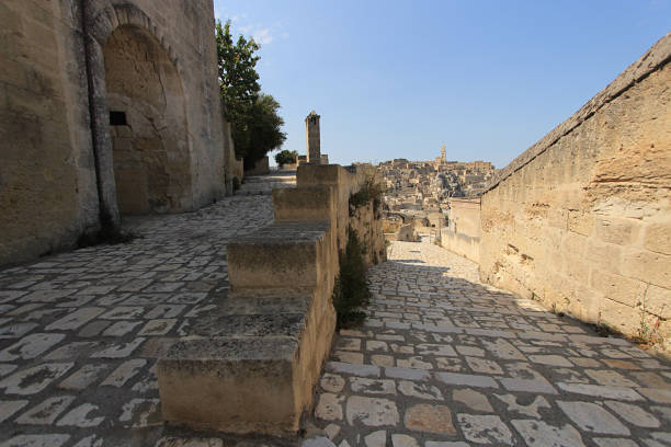 ancient stone-paved streets dug into the mountain in the ancient city of Matera. Italy.