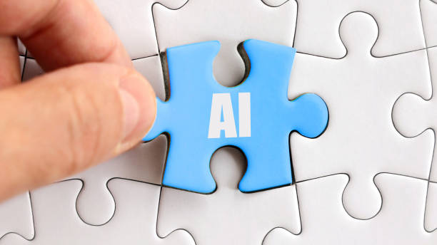 istock AI puzzle piece placed into nearly complete puzzle, symbolizing Artificial Intelligence integration 2166453062