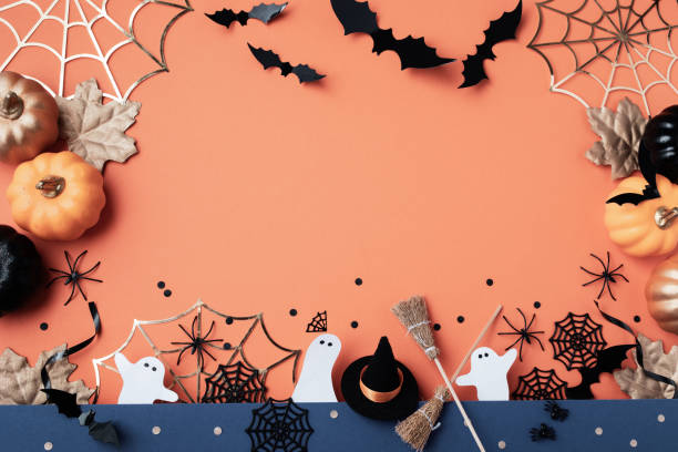 istock Spooky halloween party background from ghosts, bats, spider web top view. Happy halloween holiday greeting card, flat lay. 2166455352