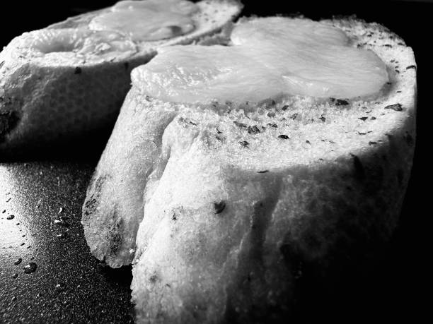 Sliced garlic baguette topped with mozzarella cheese ready to eat