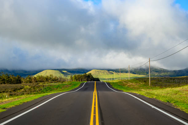 istock An empty road straight to the mountains 2166456710