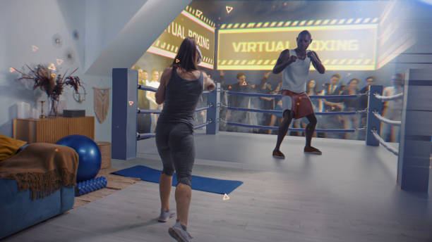 istock Athletic woman in AR headset starts online boxing training. VR screen with virtual trainer 2166463170