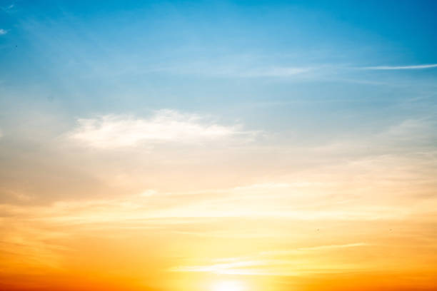 istock Beautiful , luxury soft gradient orange gold clouds and sunlight on the blue sky perfect for the background, take in everning,Twilight, Large size, high definition landscape photo 2166464844