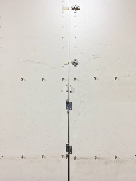 istock Screws and cabinet door 2166467961