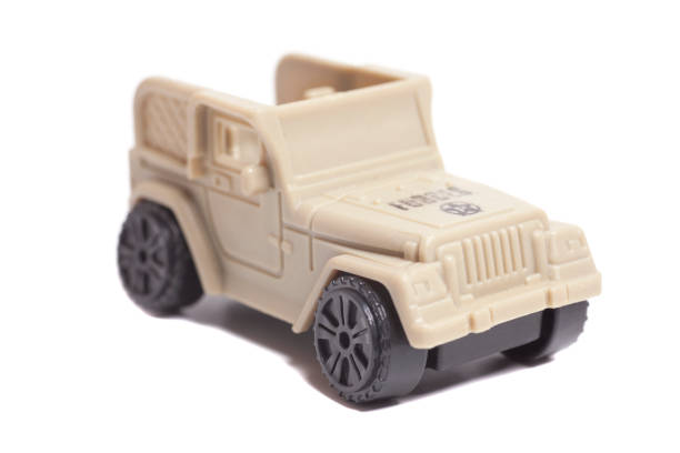 istock toy car isolated on white background. 2166469463