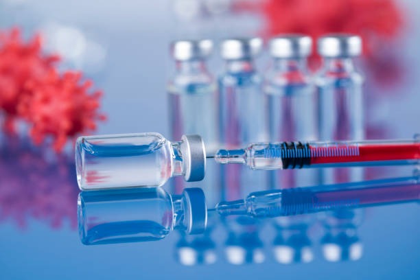istock Close up medical syringe with a vaccine 2166471464