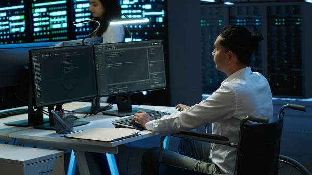 istock Wheelchair user protecting data center hardware equipment 2166471581