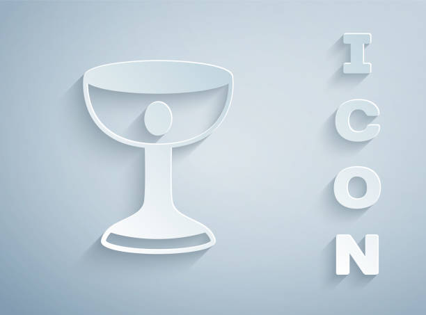 istock Paper cut Christian chalice icon isolated on grey background. Christianity icon. Happy Easter. Paper art style. Vector 2166472940