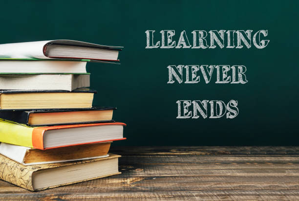 istock A stack of books with the words learning never ends written on top 2166473279