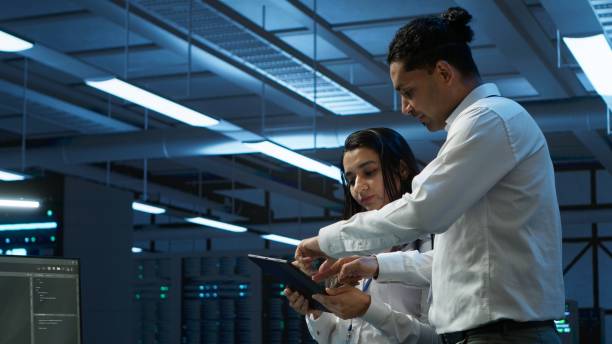 istock Employee using green screen devices in server farm used for automation 2166473774