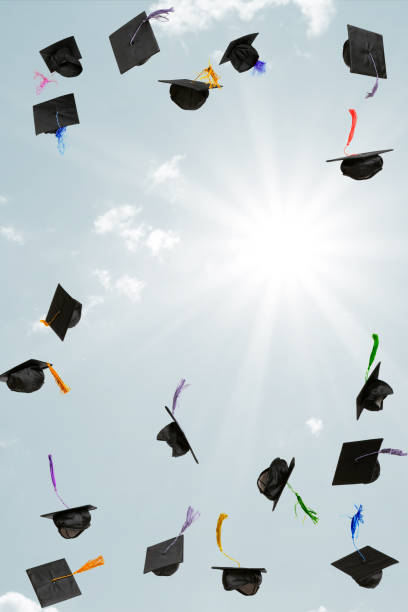 istock Mortarboards flying in the sky 2166476814