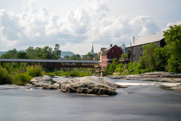 Littleton New Hampshire and the Riverwalk Covered Bridge over the Ammonoosuc River. Long Exposure Photo.