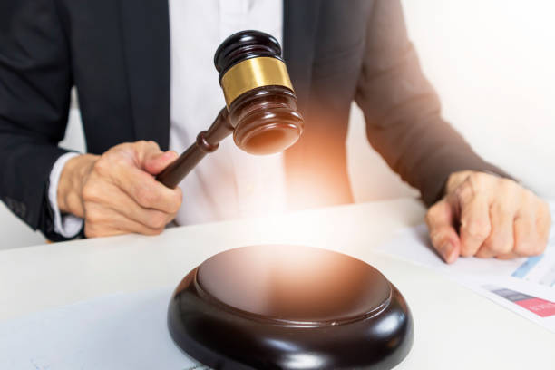 istock Judging conflicts and providing justice to people. ,Judge's Hammer in Judgment and Law,Litigation and legal action in business 2166480449