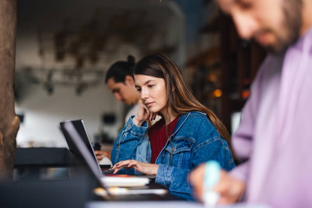 istock Students Studying Together in a Library or Coffee Shop 2166480830