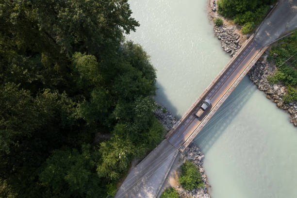 istock Aerial view of river and highway 2166481016