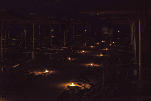 View of decorative candles on the Pesaro beach