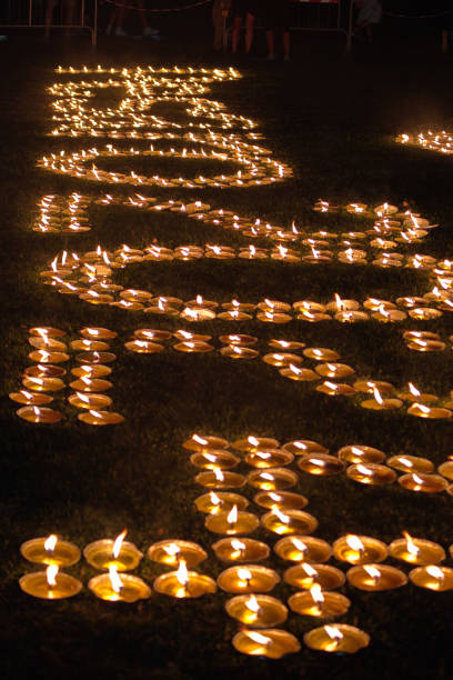 istock View of decorative candles on the beach 2166483245