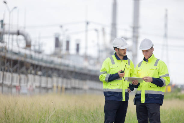 istock Petroleum engineers working at oil refinery site 2166485599