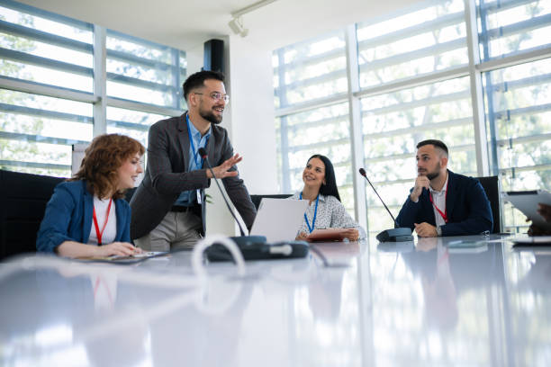 istock Man CEO talking on a meeting with his colleagues about business plan, future collaboration. 2166485660