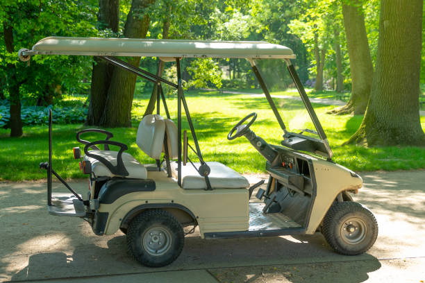 row of golf cart parking in golf course garage
