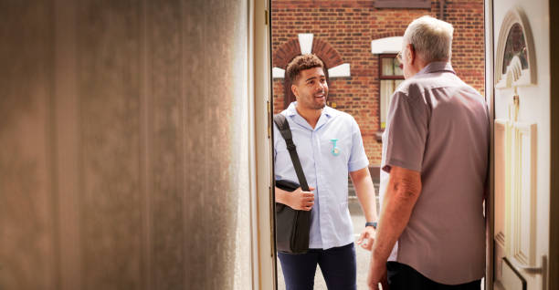 istock male care nurse house call 2166490231