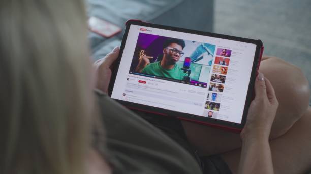 istock Caucasian woman watches educational video 3D modeling using tablet computer 2166491341