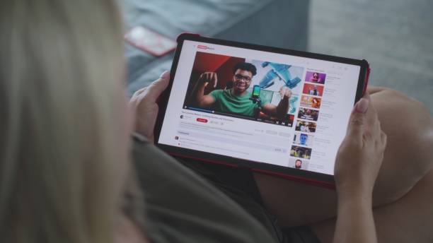 istock Caucasian woman watches educational video 3D modeling using tablet computer 2166491698