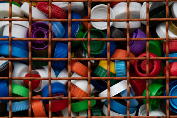 Lots of colorful, plastic bottle caps. High quality photo