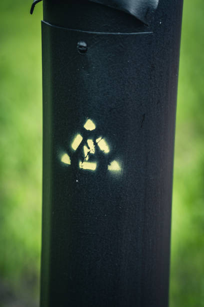 istock Power transmission support, high voltage designations on the support cover 2166492626