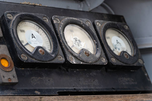 Old diesel locomotive's control panel with analog meters