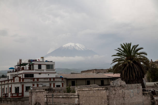 istock Snow-covered volcano peak on a cloudy morning 2166494722