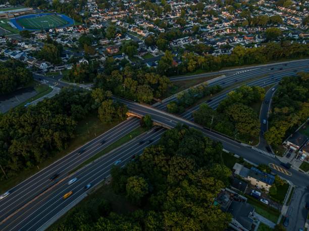 istock Drone view at sunrise over Valley Stream, New York. 2166497836
