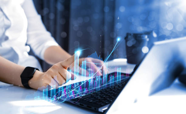 istock Trader analyzing data on virtual screen.Price graph and indicator. Stock market invest and crypto currency. Stock market and business investment. 2166497922
