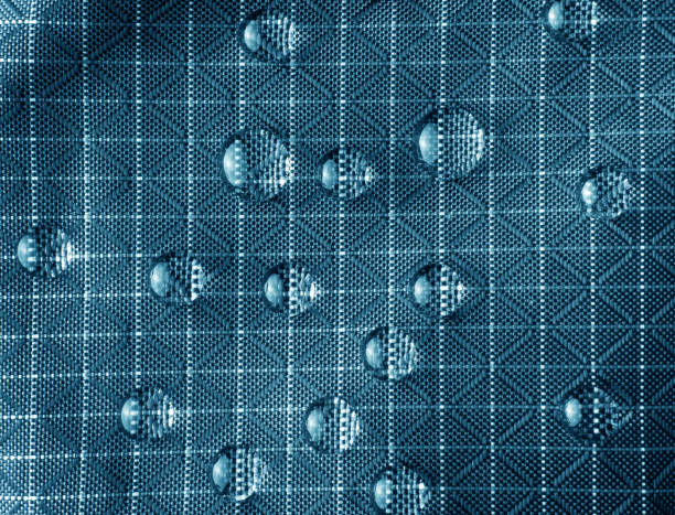Rain Water droplets on a black waterproof fabric