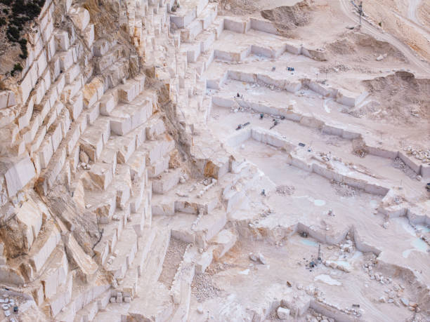 Aerial view of marble quarry with machinery and quarry equipment. Burdur, Turkey. Taken via drone.