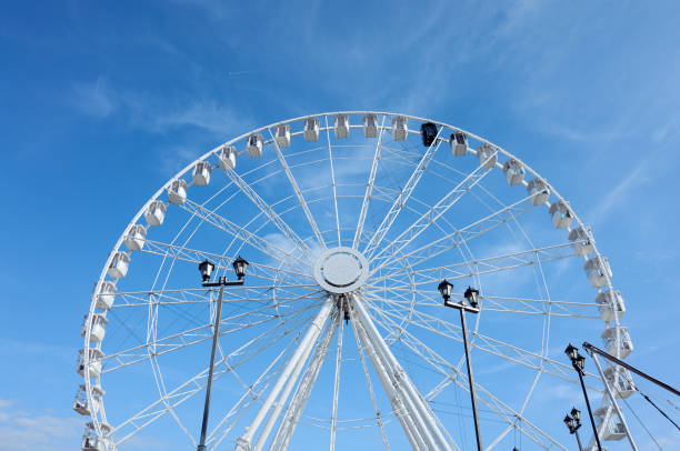 istock Ferris wheel against the blue sky. 2166506043