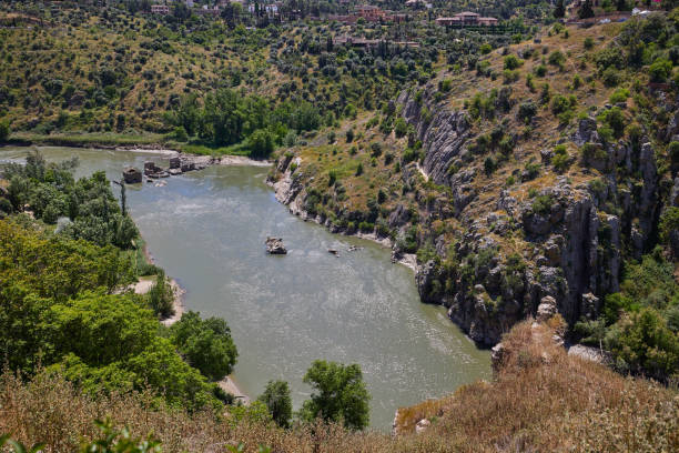 Panoramic view of the Tagus River and the surrounding hills near the city of Toledo, Spain.