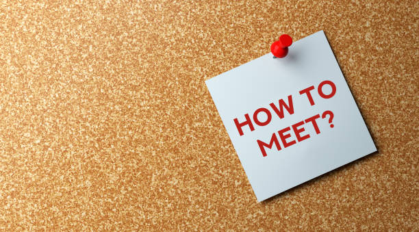 istock How to meet ? Corkboard and adhesive note. 2166513735