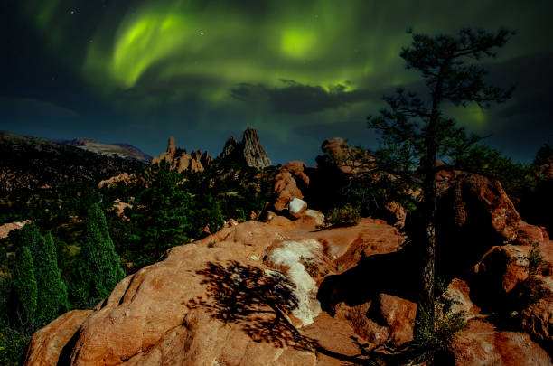 Astrophotography Aurora Borealis Sky at Garden of the Gods, Colorado Springs, Colorado Astrophotography Aurora Borealis Sky at Garden of the Gods, Colorado Springs, Colorado aurora borealis orange stock pictures, royalty-free photos & images