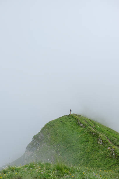 istock Scenic view of mountains in summer, hiker 2166515491
