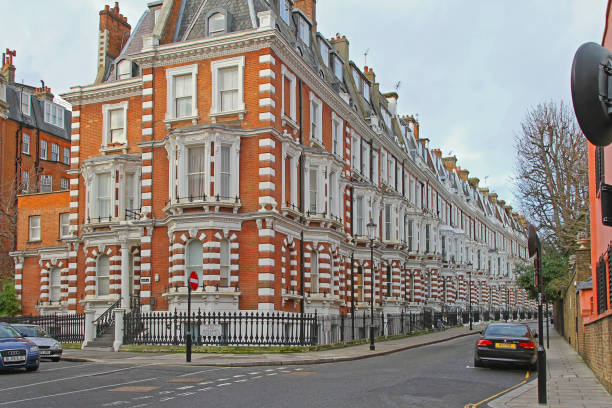 London, United Kingdom - December 26, 2009: Traditional Victorian Buildings at Corner of Hornton and Holland Streets in Royal Borough of Kensington and Chelsea Winter Day.
