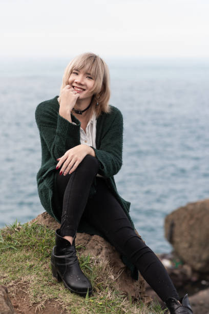 istock A non-Binary person portrait by the seaside filled with hope 2166520706
