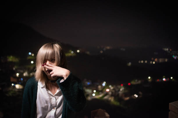 In an abandoned house near by sea and mountain Generation Z non-binary person exhibiting mental problems. \ntransgender, 20-29 years old, self healing