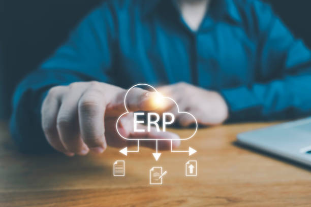 istock ERP, Enterprise resource planning concept. Businessman use smartphone to analyzing ERP system on virtual screen. Connections between business intelligence, HR and CRM modules. 2166522899