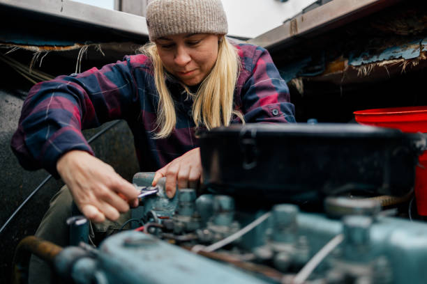 istock A Woman Performing Maintenance on Boat Engine 2166525058