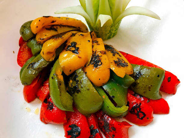 Vibrant Medley Fresh Slices of Red, Green, and Yellow Bell Peppers