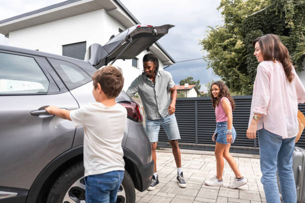 istock Diverse Family Preparing for Road Trip Adventure 2166530704